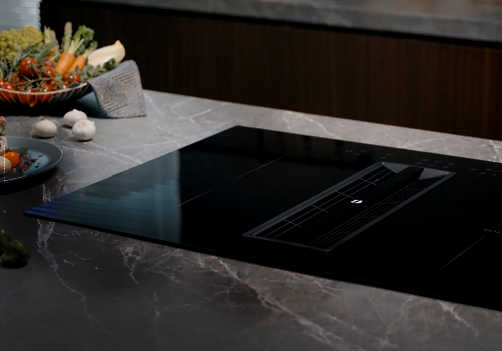 What is the difference between an electric ceramic hob and an induction hob?