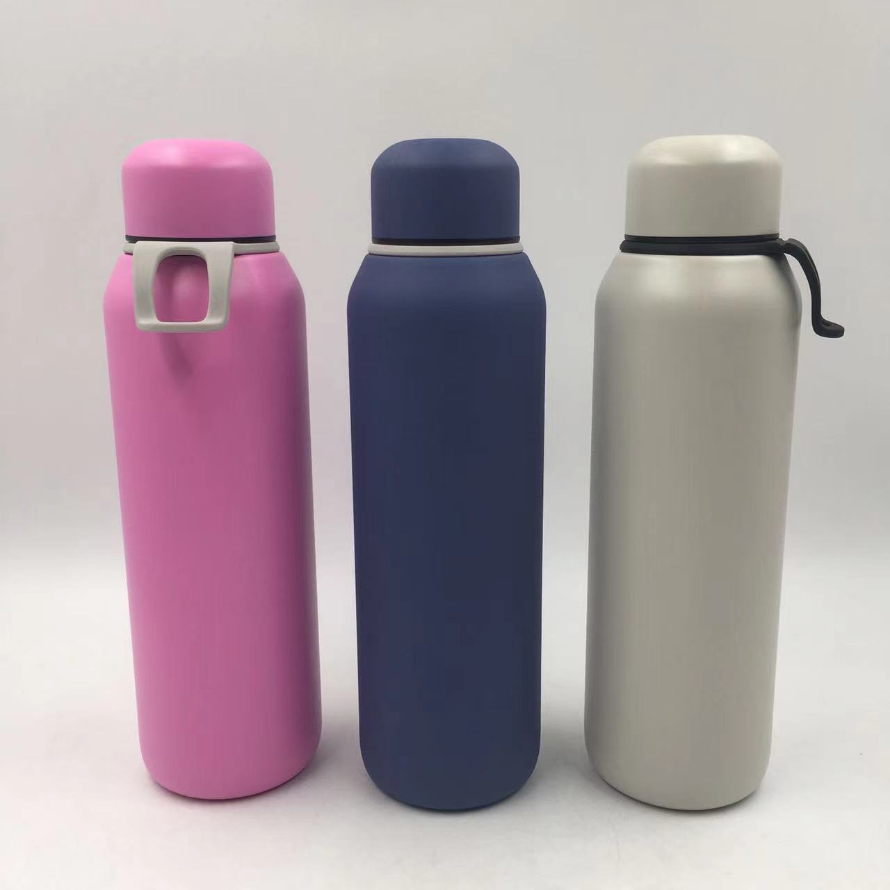 Vacuum insulated sport water bottle with a strap